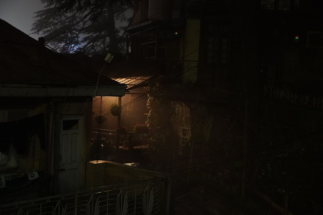 wooden houses after dark